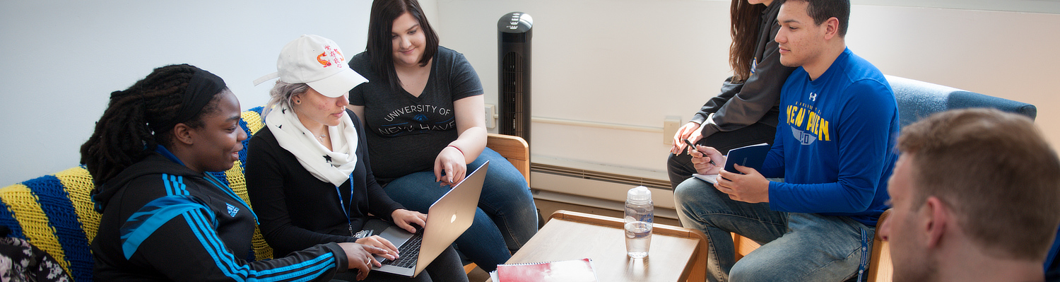 Students with a laptop