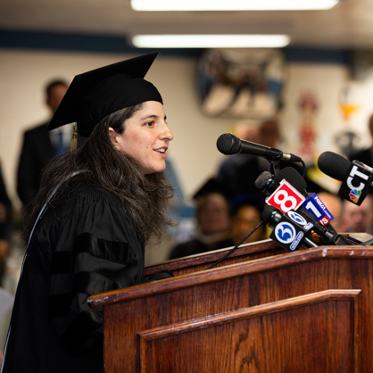 Zelda Roland, Ph.D. speaks at the 2023 commencement for the MacDougall-Walker Correctional Institution