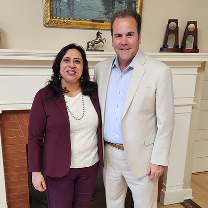 Ranjana Maitra '91 MBA and Dr. Sheahon Zenger, interim president.