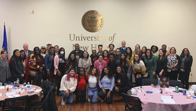 Anchal Bhatia ’24 MBA at an event on campus with her fellow Chargers.