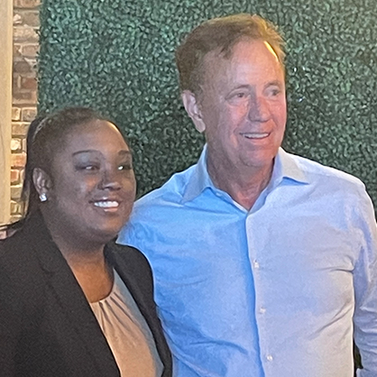 Fredlyne Antoine ’24 and Gov. Ned Lamont.