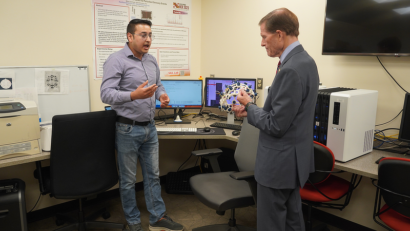 Bibek Upadhayay ’25 Ph.D. and Sen. Richard Blumenthal.