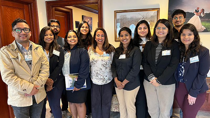 Pradeep Rajbhandari ’23 MPH (far left) at the conference.