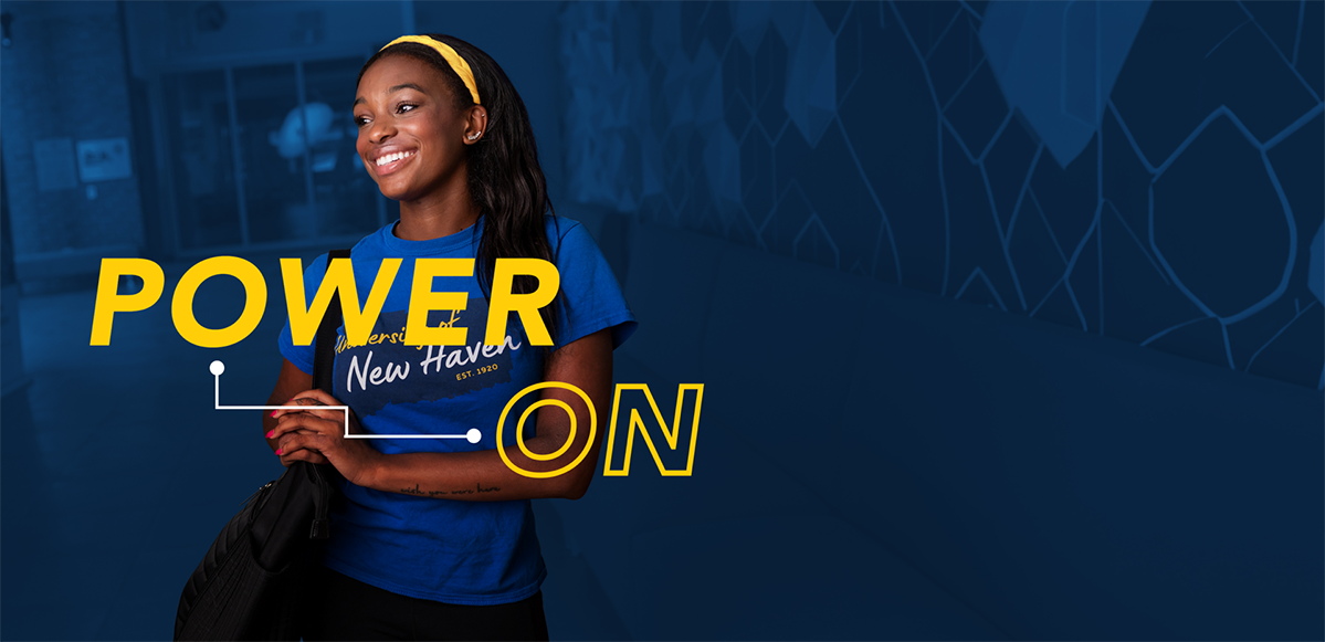 Power On graphic over a smiling student on a dark blue background.