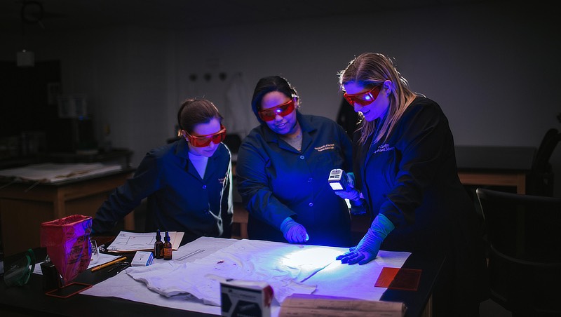 Image of Claire Glynn with students.