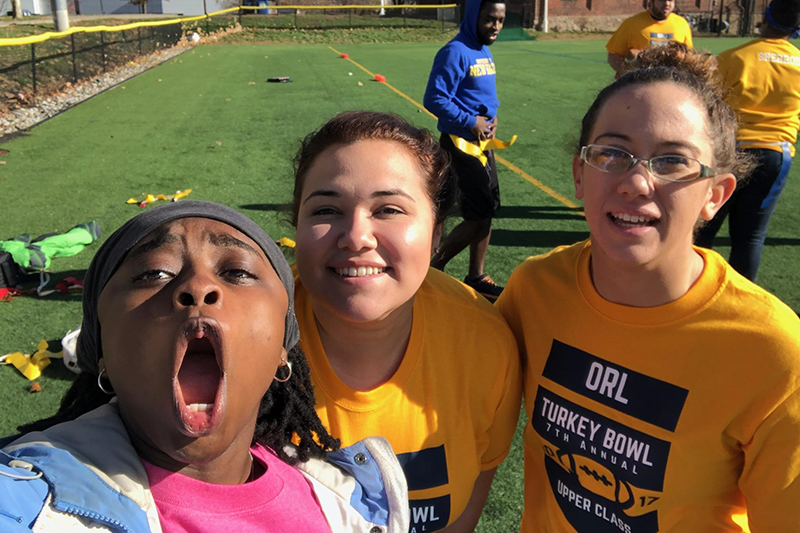 Nadine Hudson ’18 (left) with several of her fellow Chargers on campus.  