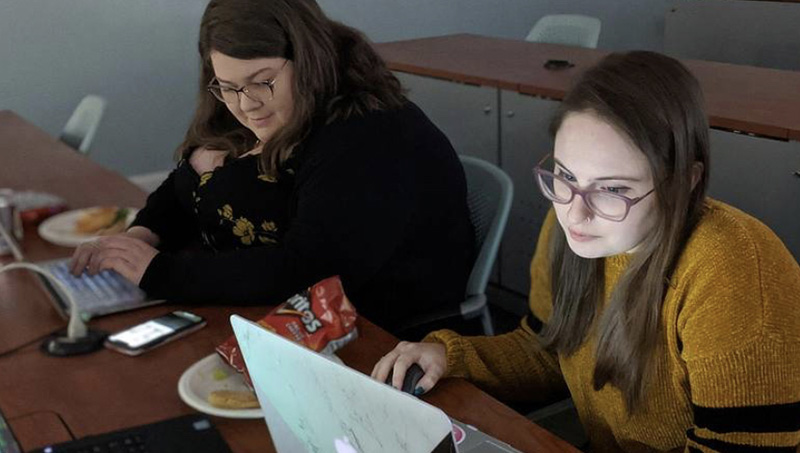 Courtney Hassenfeldt in Women in Cybersecurity chapter meeting.