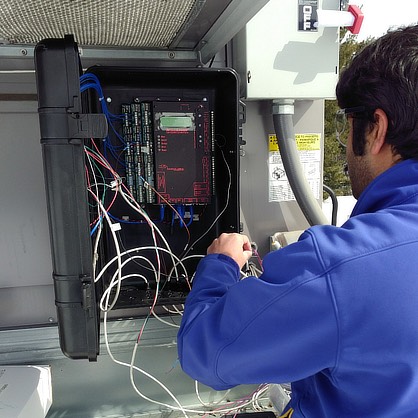 A mechanical engineering student works on an energy-efficiency project.