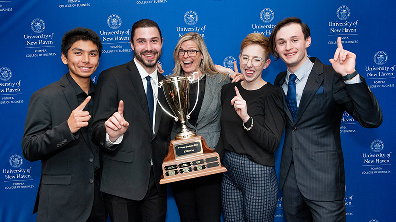 Dr. Jan Jones (center) and her students who pitched Drop, the team that captured first place in the pitch competition.