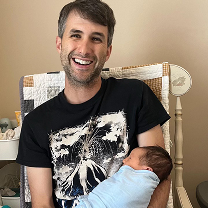 Jeff Hunt holding his son Artie when he was a week old. 