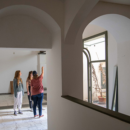 Prof. Slenker and students discuss the layout of the tenant space.