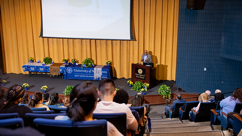 Ivo E. Philbert ’88 delivering the keynote address as part of the Celebration of Excellence.