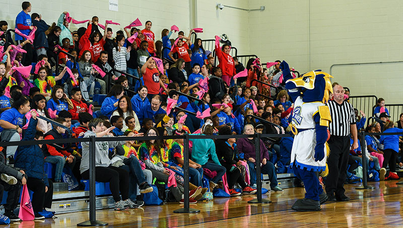 Image of Charlie and the students cheering.