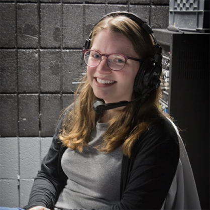 Rebecca Satzberg with headset