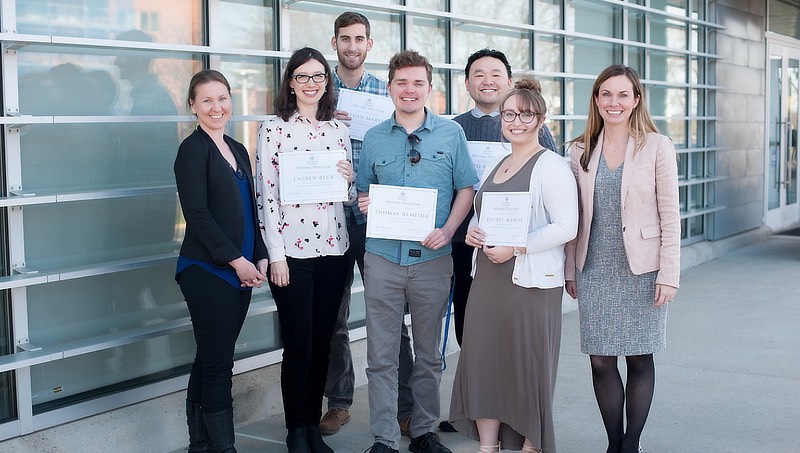 Alvin Tran and Jenna Sheffield with coworkers.