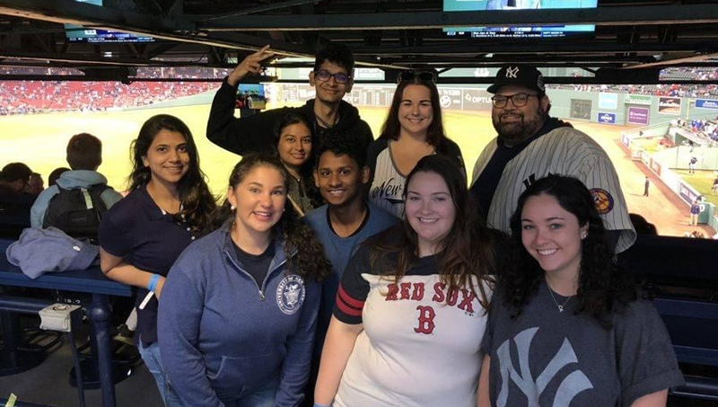 Steve Macchiarolo and students at Fenway enjoying a game.