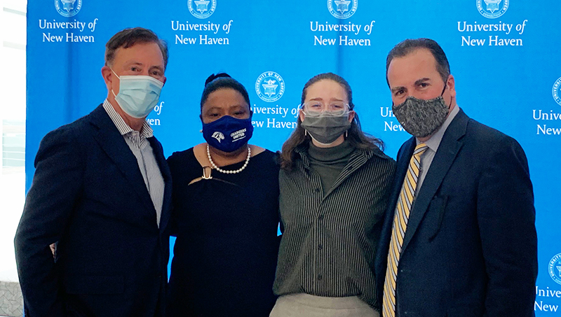 Left to right: Gov. Ned Lamont, Ophelie Rowe-Allen, Elizabeth Sirett ’22, and Sheahon Zenger.