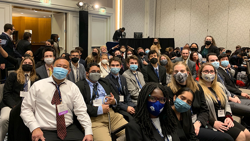 KChris Haynes, Ph.D. (front, left), and students at the conference.