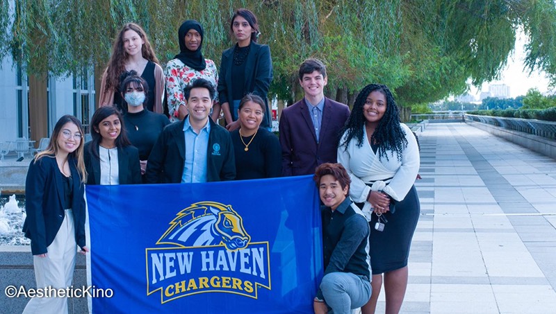 Alvin Tran, Sc.D., MPH (center) and students in Washington, D.C.