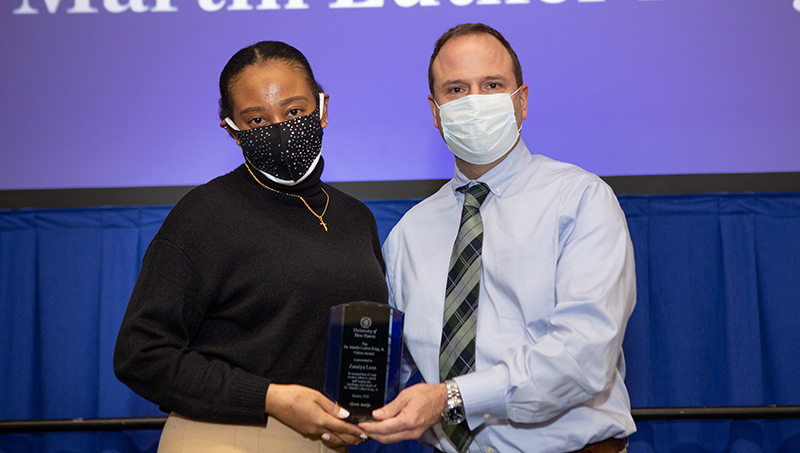 Image of Zanaiya Léon ’18, ’20 MBA, and Ric Baker.