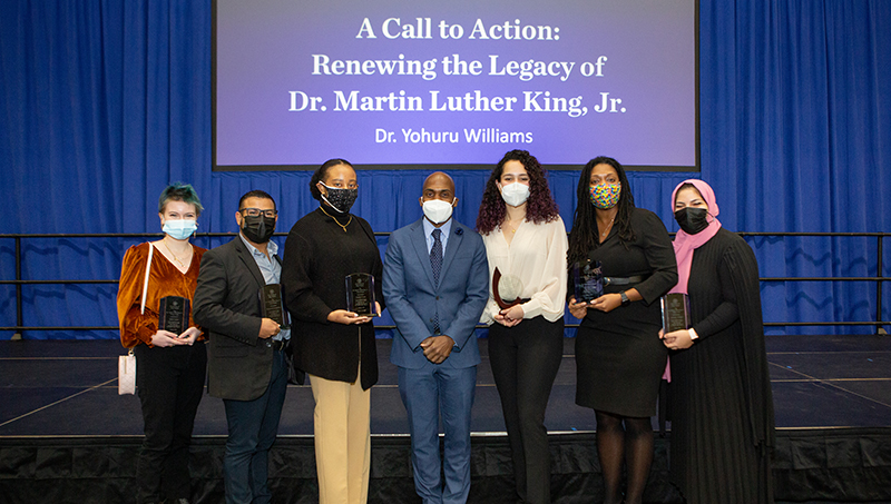 Group Image of left to right: Mary Lippa ’23, Richard Concepcion ’20, ’22 M.A., Zanaiya Léon ’18, ’20 MBA, Dr. Yohuru Williams, Sofia Martinez ’22, Dr. Danielle Cooper, and Adrielys Gomez ’22.