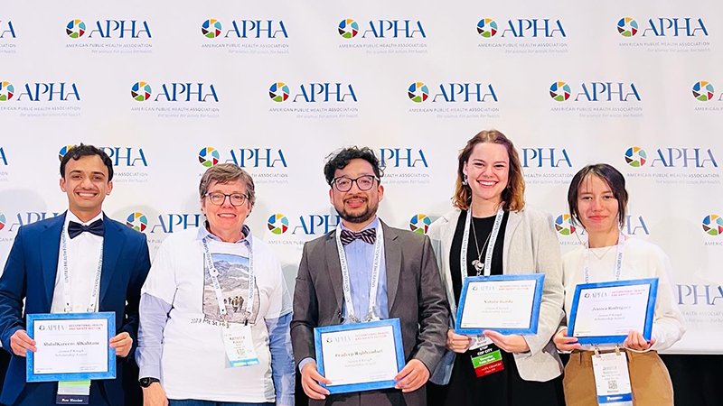 Pradeep Rajbhandari ’24 MPH (center) at the conference. 