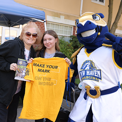 Charlie the Charger enjoyed greeting the newest Chargers who all received t-shirts to wear for their class photo.