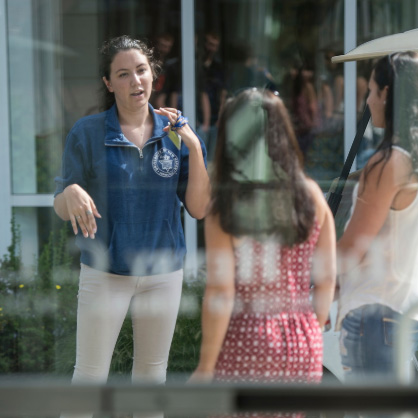 Image of orientation leader talking to students