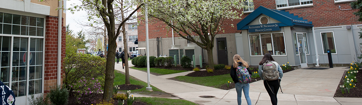 Students walking near Nicholson Health Center